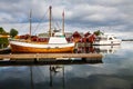 traditional fisherman houses rorbu and boats at Haholmen island, Norway Royalty Free Stock Photo