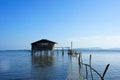 Traditional fisherman's house on stilts in the sea.