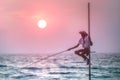 Traditional fisherman at the sunset, Sri Lanka.