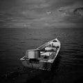 A traditional fisherman's boat at Jubakar Beach, Tumpat Kelantan, malaysia. Soft and grain image. Black &white photography.