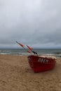 Traditional fishing boat docking on the beach. Dabki, Poland