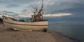 Traditional fishing boat docking on the beach. Dabki, Poland