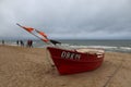 Traditional fishing boat docking on the beach. Dabki, Poland