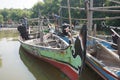 Traditional fishing boat made of wood is docked