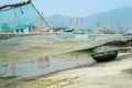 Traditional Fishing Boat with Net and Woven Bamboo Basket Boat At The Fishing Village in Da Nang, Vietnam