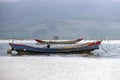 Traditional fishing boat in oyster farming industry in Lap An Lagoon, Vietnam Royalty Free Stock Photo