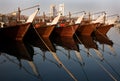 Traditional fishing boats dhow in the Fishing harbor of Manama, Bahrain Royalty Free Stock Photo