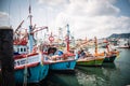 Traditional fishing boats dock at Bang Saray Pier, Sattahip District, Thailand