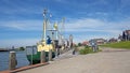 Traditional fishing boats in the harbor from Workum in the Netherlands Royalty Free Stock Photo