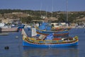 Fishing boats in the harbour of Marsaxlokk in Malta Royalty Free Stock Photo