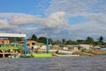 Traditional fishing boats and houses, Cayapas River, Esmeraldas province, Ecuador Royalty Free Stock Photo