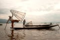 Traditional fishing by net in Inle lake,Myanmar. Royalty Free Stock Photo