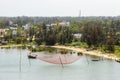 Traditional Fishing Net On Thu Bon River And Small Village In Quang Nam Province, Vietnam. Royalty Free Stock Photo