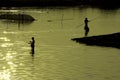 Traditional fishing during sunset, U-Ben Bridge Royalty Free Stock Photo