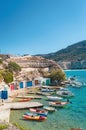 Traditional fishing village of Firopotamos small harbor and fishing boats on Milos Island in Greece Royalty Free Stock Photo