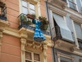 Traditional flamenco dance dresses costumes hanging on a spanish andalusian house balcony facade in MÃÂ¡laga Royalty Free Stock Photo