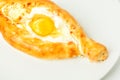 Traditional flatbread khachapuri or hachapuri with egg