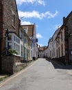 Flint built houses and shops in the High Street of Blakeney, North Norfolk in the UK