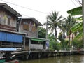 Traditional floating habitats along the canal with very natural rural life in Thailand. Royalty Free Stock Photo