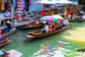 Traditional floating market in Damnoen Saduak near Bangkok Royalty Free Stock Photo