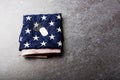 Traditional folded of America United States flag and tag Royalty Free Stock Photo