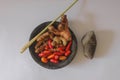 Traditional food ingridients on the stone mortar with pestle