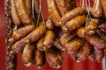 Traditional food. Smoked sausages meat hanging in european food