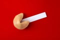 Traditional fortune cookie on red background Royalty Free Stock Photo