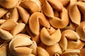 Traditional fortune cookies as background, closeup view