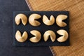 Traditional fortune cookies black slate background