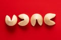 Traditional fortune cookies on red background