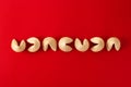 Traditional fortune cookies on red background