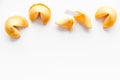 Traditional fortune cookies on white table top-down copy space