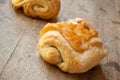 Traditional french chocolatine on wooden background