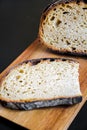 Traditional French country bread slices on a cutting board Royalty Free Stock Photo