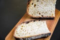 Traditional French country bread slices on a cutting board Royalty Free Stock Photo