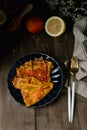 Traditional french crepes suzette with red bloody oranges, russian blini pancakes - Shrovetide maslenitsa festival meal