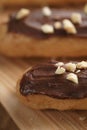 Traditional french eclairs with chocolate and hazelnuts Royalty Free Stock Photo