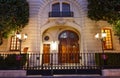 Traditional French house with typical balconies and windows at night . Paris . Royalty Free Stock Photo