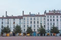 Traditional French housing buildings with 19th century facades on Place Bellecour square, a touristic landmark of the city center