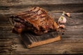 Traditional French Pate en croute with goose meat and liver as closeup on a wooden board. banner menu recipe place for text Royalty Free Stock Photo