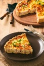 Traditional french pie with bacon and cheese - quiche lorraine.