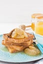 Traditional French toasts for breakfast with caramelized apples Royalty Free Stock Photo