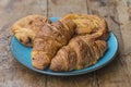 Traditional french viennoiseries on the blue plate Royalty Free Stock Photo