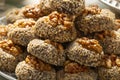 Traditional fresh baked Moroccan Ghoriba cookies topped with a walnut close up Royalty Free Stock Photo