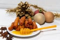 Traditional fried pestiÃÂ±os with honey and anise prepared for Christmas and Easter in Spain