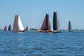 Traditional Frisian wooden sailing ships in a yearly competition in the Netherlands Royalty Free Stock Photo