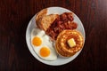 Traditional full american breakfast eggs pancakes with bacon and toast Royalty Free Stock Photo