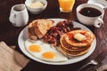 traditional full american breakfast eggs pancakes with bacon and toast Royalty Free Stock Photo