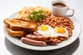 Traditional full English breakfast with fried eggs, sausages, beans, grilled tomatoes and bacon. AI Generated Royalty Free Stock Photo